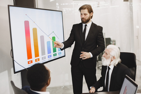 African man in a black suit.